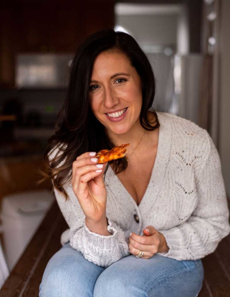 Megan eating a healthy pizza